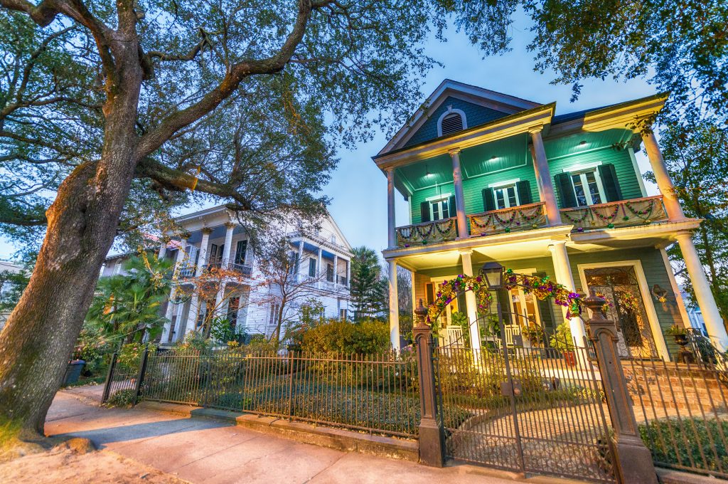 Neighborhoods of New Orleans, colorful houses, decorations, trees