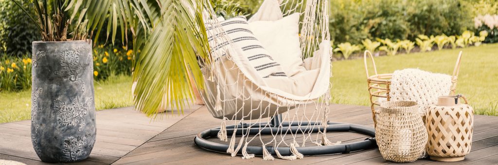 summer design tips 2019, boho chic, hanging chair, neutral colors, patio, interior design, outdoor living space