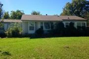 81 E. Lamar St.