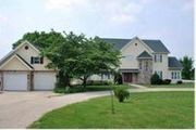 9858 N.W. Blair Ln.